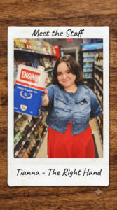 Tianna, "The Right Hand" of the Jesse's team in Margate, FL, restocking shelves at Jesse's Liquor Store
